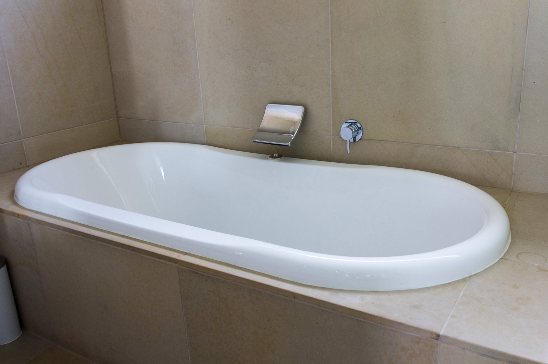 luxury bath with chrome and stone